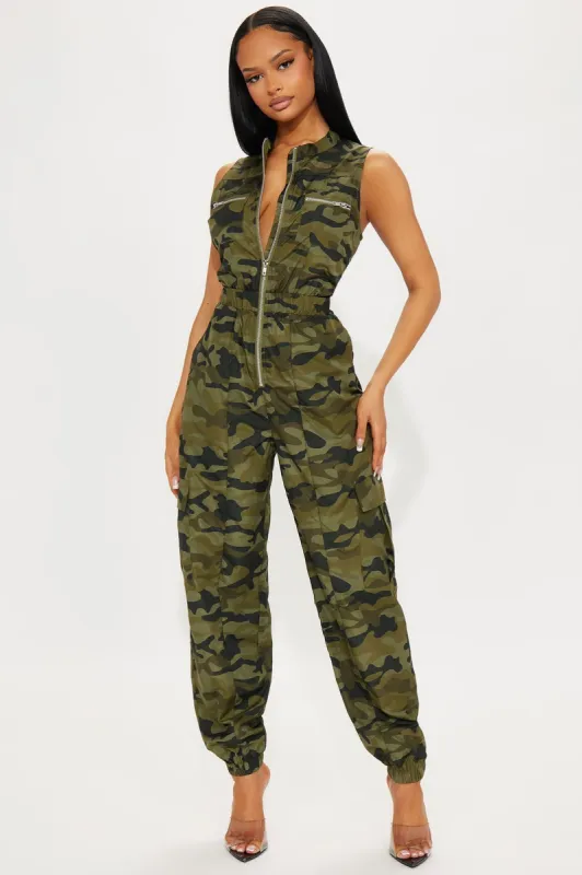 Hidden in Plain Sight  Camo Jumpsuit - Green/combo sold by Fashion Nova