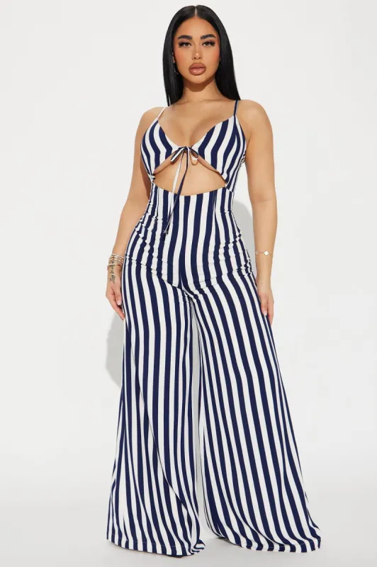 Right My Wrongs Jumpsuit  - Navy/combo sold by Fashion Nova