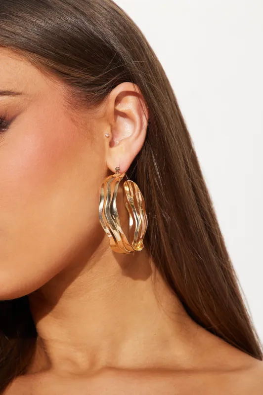 Tall Waves Hoop Earrings  - Gold sold by Fashion Nova