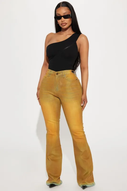 Leading The Pack Coated Stretch Flare Jeans - Yellow sold by Fashion Nova