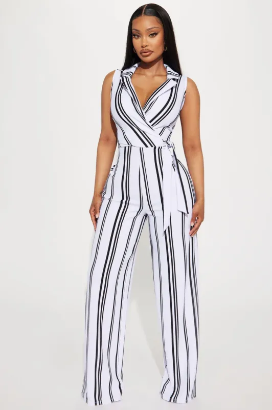 Leana Pinstripe Jumpsuit - White/combo sold by Fashion Nova