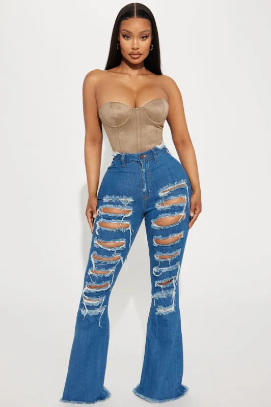 Perfect Storm Shredded Stretch Flare Jeans - Medium Wash sold by Fashion Nova