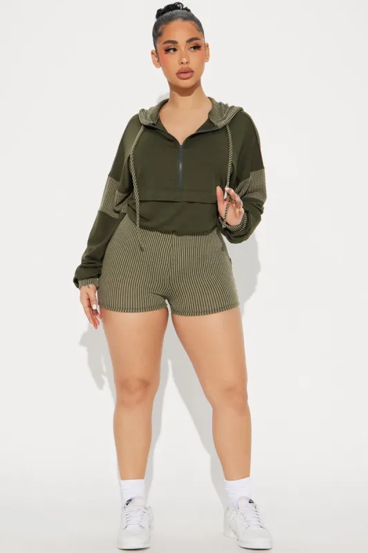 Off The Stage Hoodie Romper - Olive sold by Fashion Nova