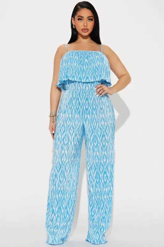 Bring The Sunshine Jumpsuit - Blue/combo sold by Fashion Nova