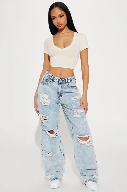 No Regrets Ripped Baggy Wide Leg Jean - Light Wash sold by Fashion Nova