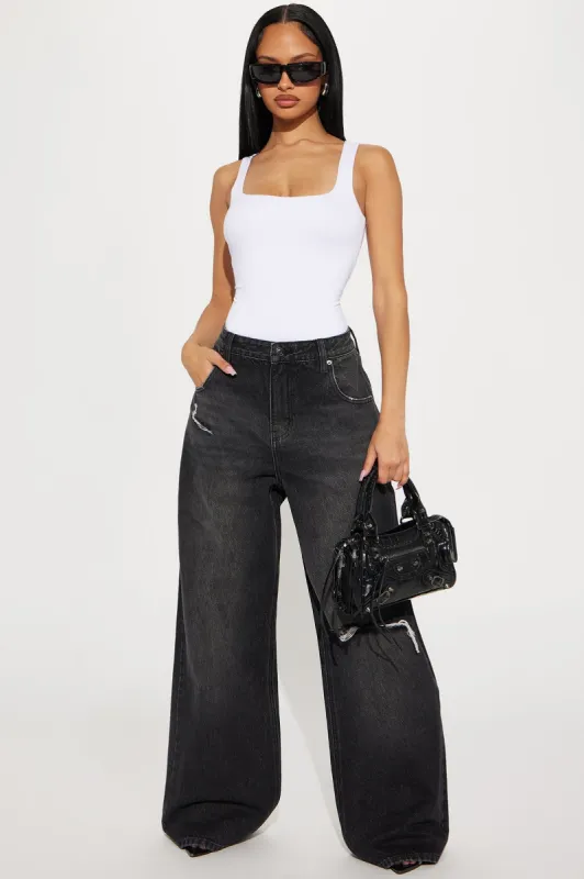 In The Game Baggy Jeans - Black Wash sold by Fashion Nova