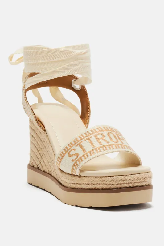 Any Time Any Place Wrap Up Wedges - Off  White/combo sold by Fashion Nova