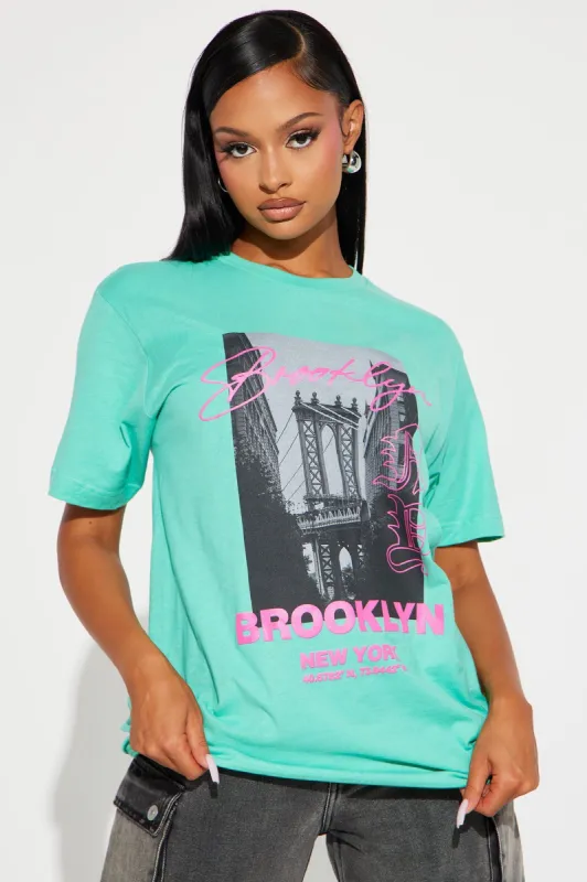Brooklyn Baby Graphic Tee - Mint sold by Fashion Nova