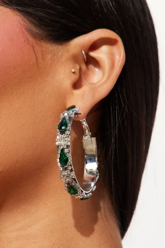 Revolve Around Me Earrings - Silver/Green sold by Fashion Nova