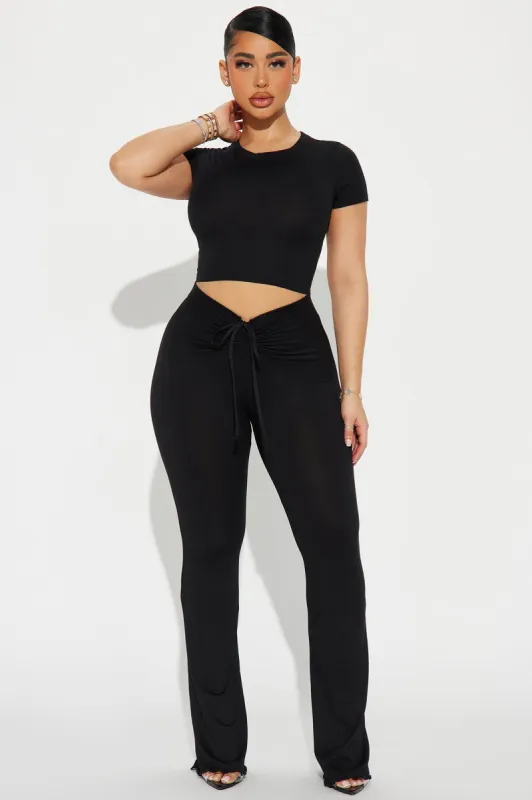 Alana Ruched V Front Flare Pant - Black sold by Fashion Nova