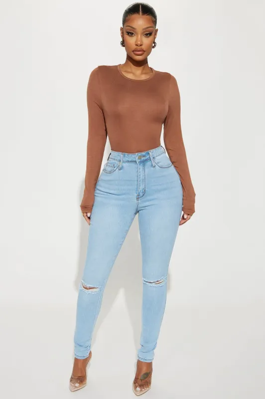 Here We Are Ripped Stretch Skinny Jeans - Light Wash made by Fashion Nova