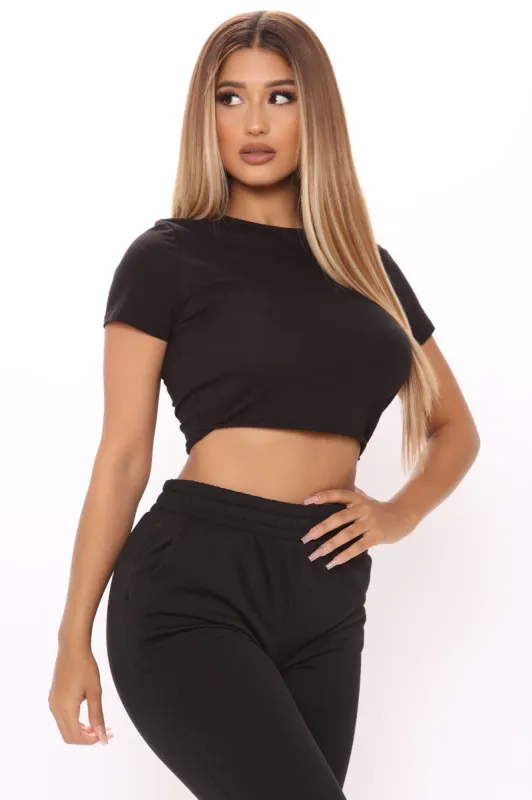 Never Leaving My Bed Crop Tee And Jogger Set - Black sold by Fashion Nova