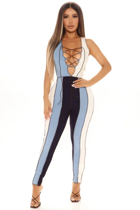 Tanya Lace Up Jumpsuit - Blue/combo sold by Fashion Nova