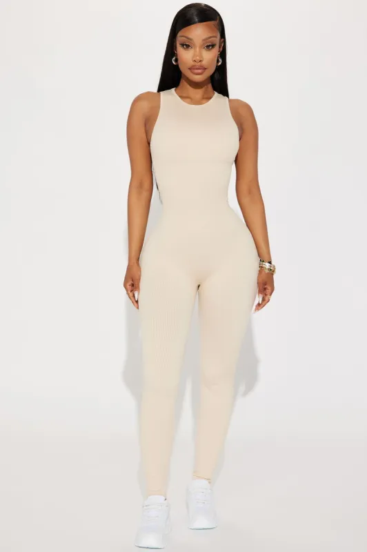 Effortless Kim Ribbed Seamless Jumpsuit - Sand sold by Fashion Nova