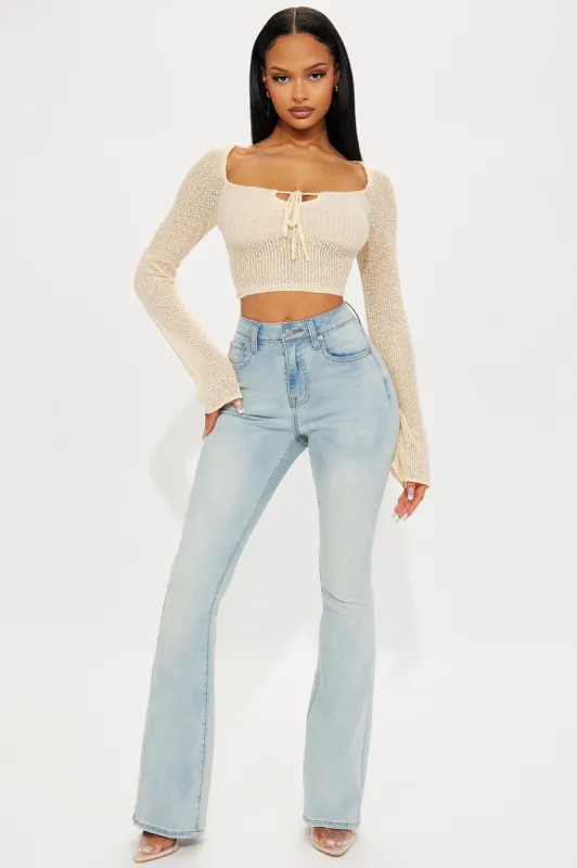 Talia Sculpting Stretch Flare Jeans - Light Wash sold by Fashion Nova