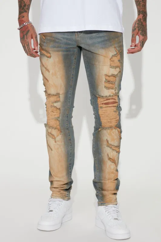 I Been Spinnin Destroyed Vintage Stacked Skinny Jeans - Vintage Blue Wash sold by Fashion Nova