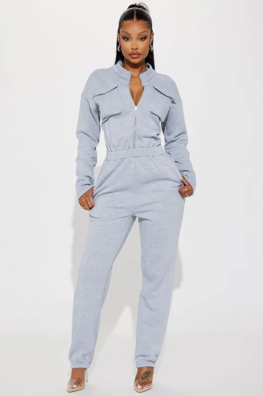 Part Of The Story Jumpsuit - Heathered Grey sold by Fashion Nova