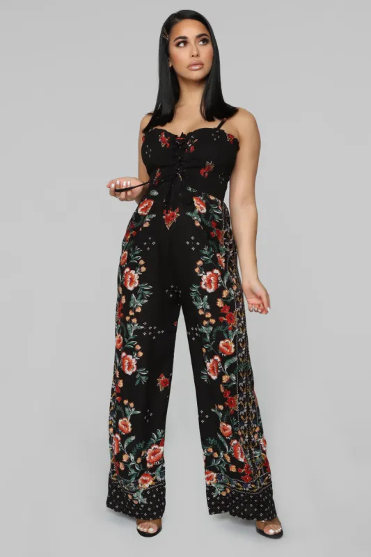 Temecula Smocked Jumpsuit - Black/Multi sold by Fashion Nova