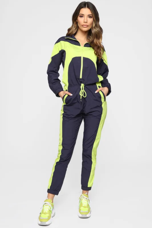 Just My Style Windbreaker Jumpsuit - Navy/Lime sold by Fashion Nova