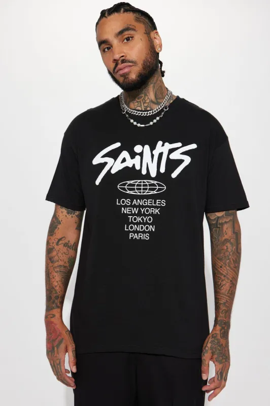 Saints Tour Short Sleeve Tee - Black sold by Fashion Nova