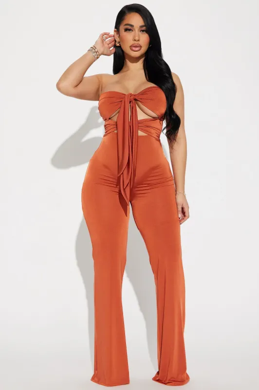Latest Update Jumpsuit - Bronze sold by Fashion Nova