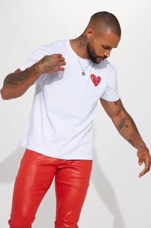 Keith Haring Heart Logo Short Sleeve Tee - White sold by Fashion Nova