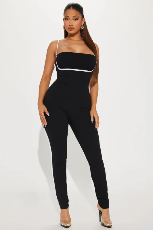Come Around Jumpsuit  - Black sold by Fashion Nova