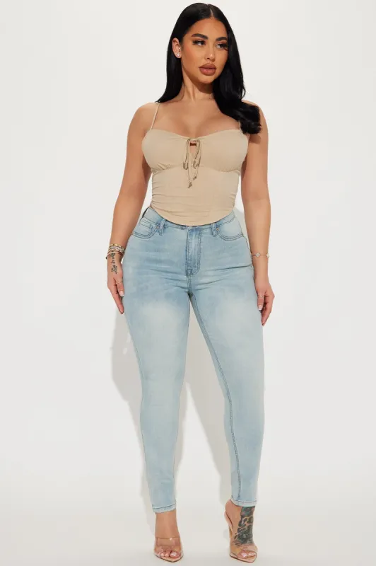 Cora Booty Lifting Stretch Skinny Jeans - Light Wash sold by Fashion Nova