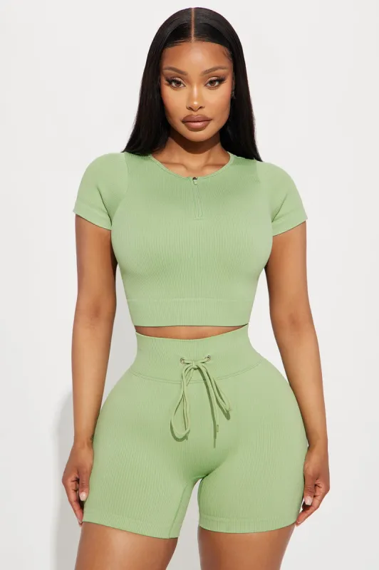 Total Body Active Top - Sage sold by Fashion Nova