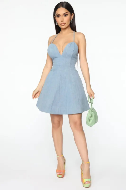 All I've Been Doing Denim Mini Dress - Light Wash sold by Fashion Nova