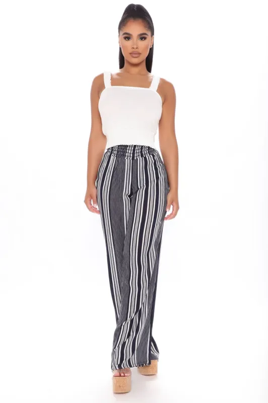 Lining It Up Striped Pants - Navy/combo sold by Fashion Nova