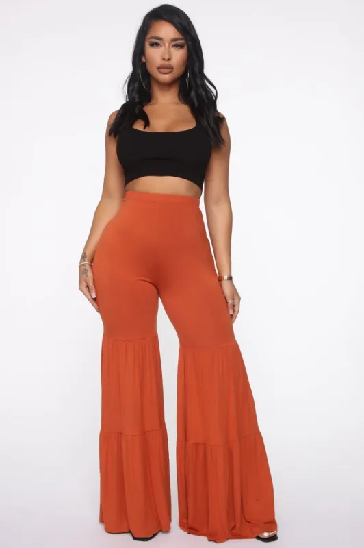 Walk On The Wild Side Honey Flare Pant - Rust sold by Fashion Nova