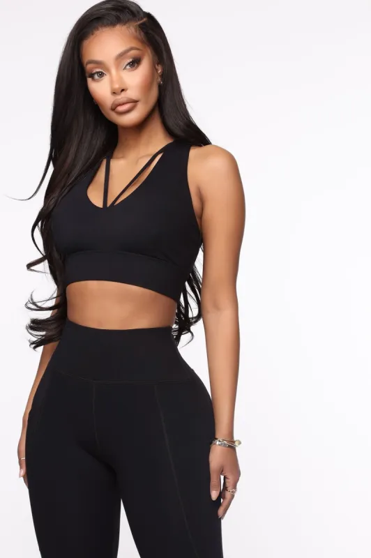 Passionate Sports Bra In Power Flex - Black sold by Fashion Nova