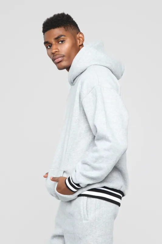 Striped Hem Hoodie - Heather Grey sold by Fashion Nova