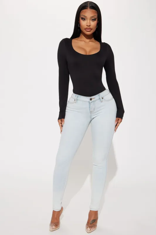 Flexing On You Soft Stretch Skinny Jeans - Bleach Blue Wash sold by Fashion Nova
