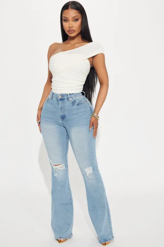 Then And Now Flare Jeans - Light Wash sold by Fashion Nova