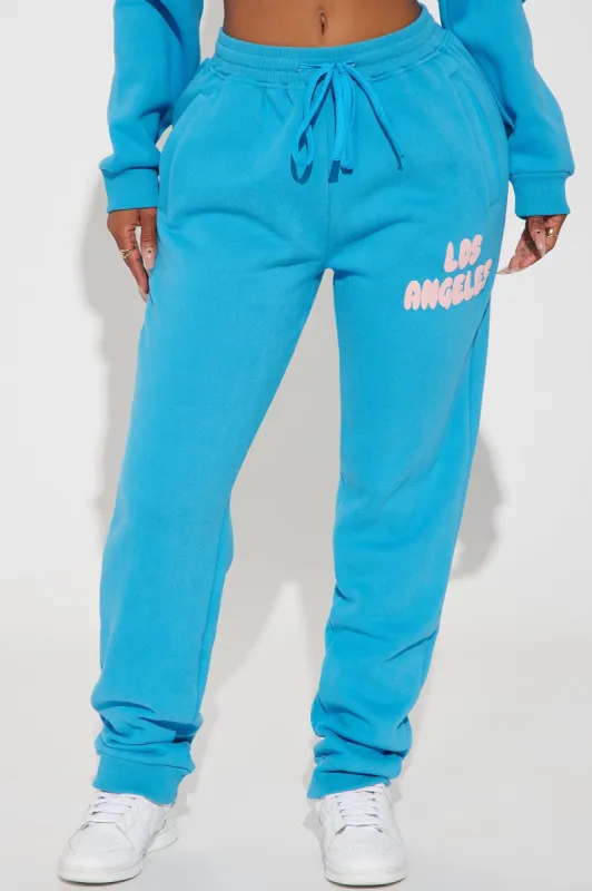 Los Angeles Puff Print Jogger - Blue sold by Fashion Nova