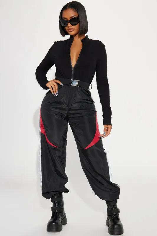Sports Series Jumpsuit - Black/Red sold by Fashion Nova