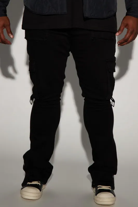 Bring The Vibe Stacked Skinny Snap Flare Jeans - Black sold by Fashion Nova