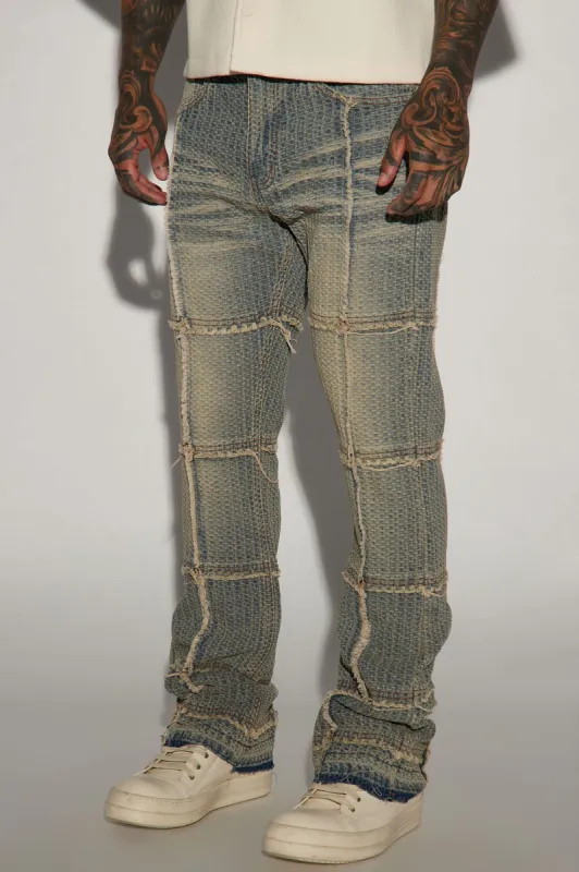 Cross Me Textured Stacked Slim Flare Jeans - Vintage Blue Wash sold by Fashion Nova