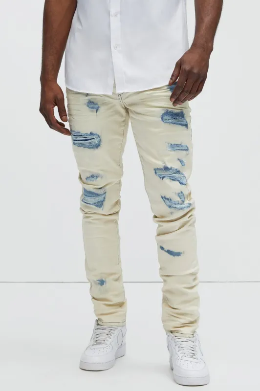 Mansur Destroyed Skinny Jeans - Bleach Blue Wash sold by Fashion Nova
