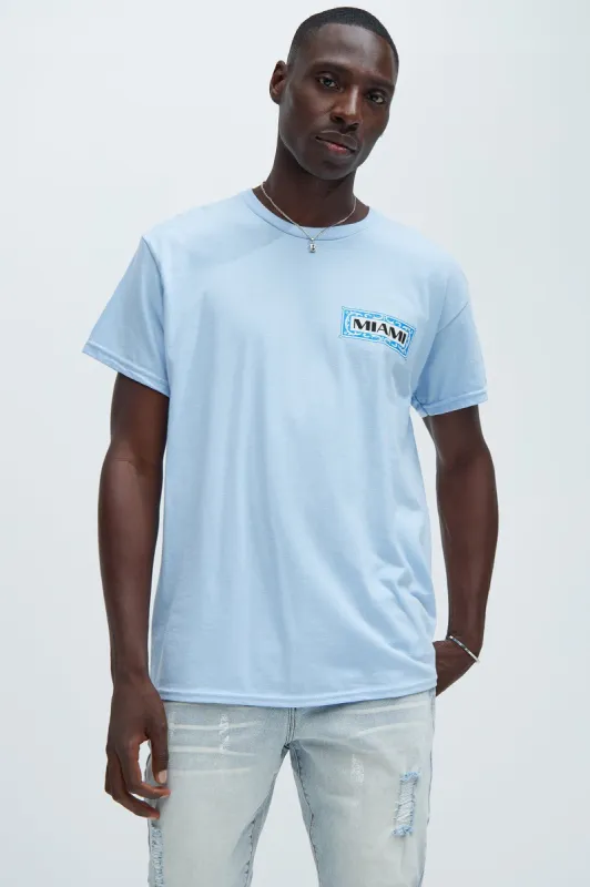 Flamingo Miami Short Sleeve Tee - Light Blue sold by Fashion Nova