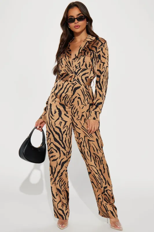 On A Safari Long Sleeve Jumpsuit - Tan/Multi sold by Fashion Nova