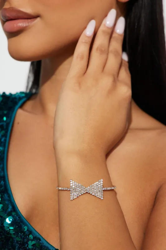 Classy Bow Bracelet - Gold sold by Fashion Nova