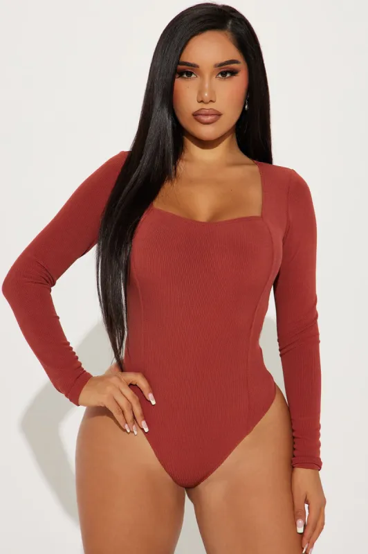 Judy Ribbed Bodysuit - Brick Red sold by Fashion Nova