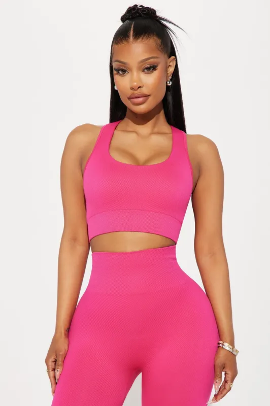 The Rise Seamless Sports Bra - Fuchsia sold by Fashion Nova