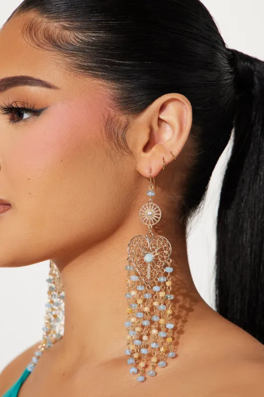 Open Your Heart To Me Earrings - Gold/Blue sold by Fashion Nova