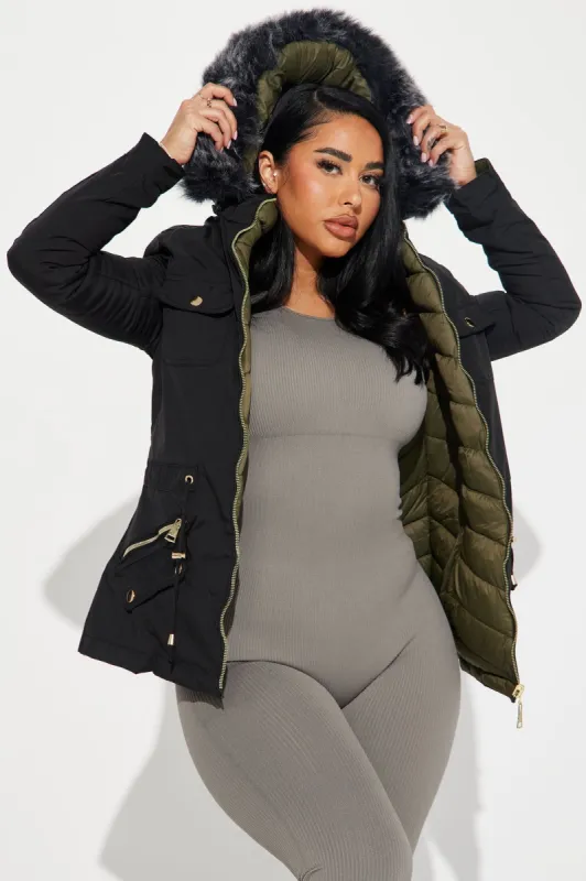 Anabelle Reversible Long Puffer Jacket - Black/combo sold by Fashion Nova