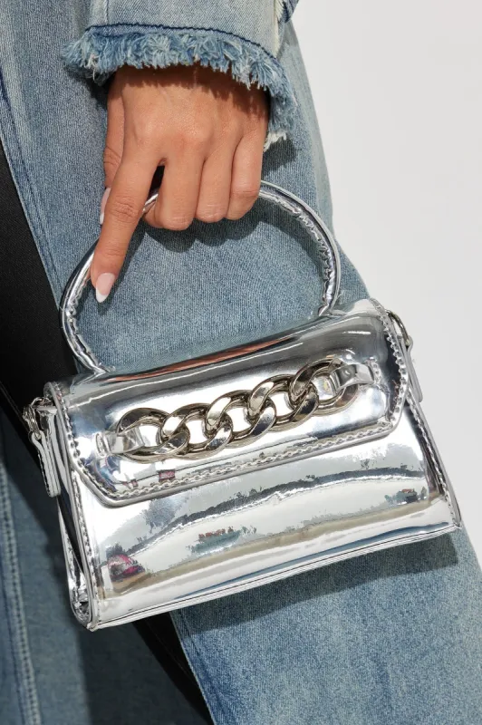 Metallic Baby Handbag  - Silver sold by Fashion Nova