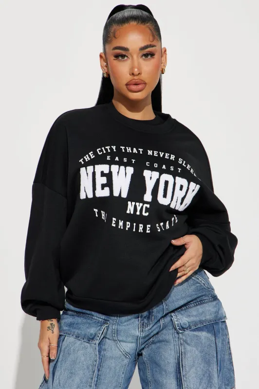 The City Never Sleeps NY Sweatshirt - Black sold by Fashion Nova